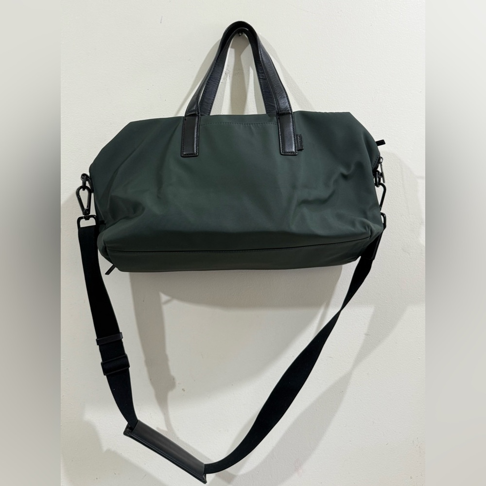 Away Dark Green Duffel Bag with Black Handles and Strap